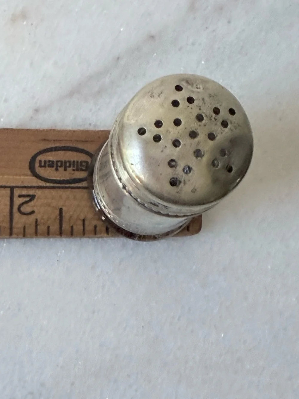 pair of antique EPNS silver salt and pepper shakers